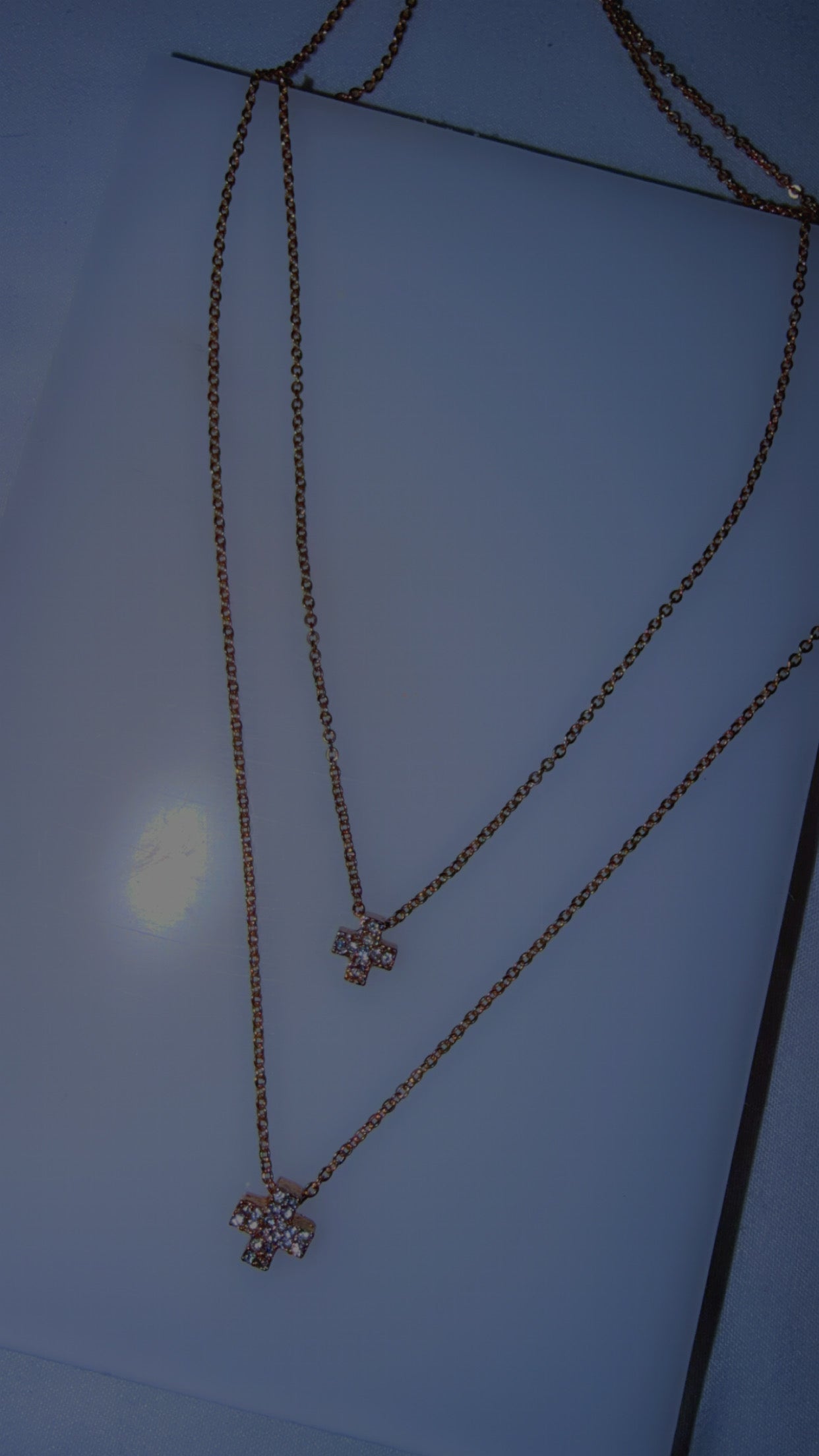 Gold double cross necklace