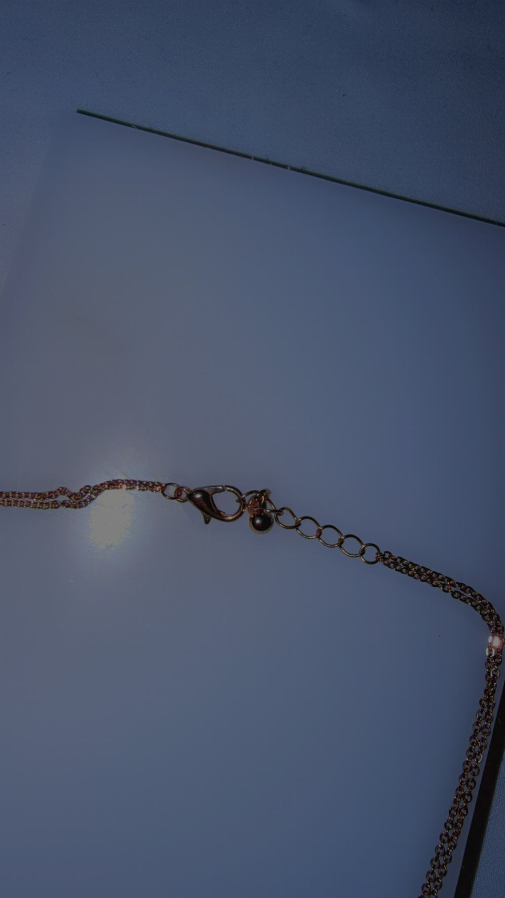 Gold double cross necklace
